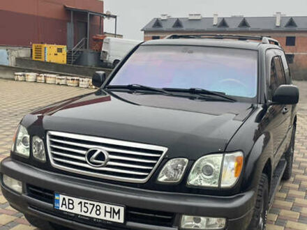 Черный Лексус ЛХ, объемом двигателя 4.66 л и пробегом 305 тыс. км за 17000 $, фото 1 на Automoto.ua