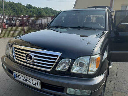 Черный Лексус ЛХ, объемом двигателя 4.66 л и пробегом 352 тыс. км за 15600 $, фото 1 на Automoto.ua