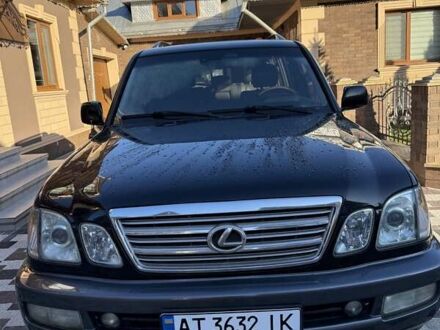 Черный Лексус ЛХ, объемом двигателя 4.66 л и пробегом 292 тыс. км за 12800 $, фото 1 на Automoto.ua