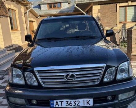 Черный Лексус ЛХ, объемом двигателя 4.66 л и пробегом 292 тыс. км за 12800 $, фото 1 на Automoto.ua