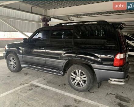 Черный Лексус ЛХ, объемом двигателя 4.7 л и пробегом 250 тыс. км за 16500 $, фото 1 на Automoto.ua