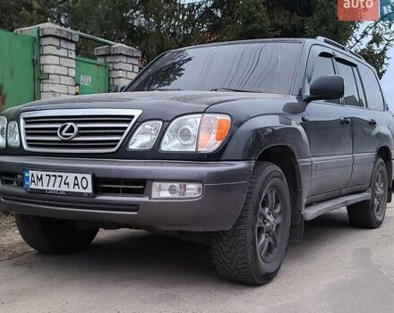 Черный Лексус ЛХ, объемом двигателя 4.66 л и пробегом 276 тыс. км за 14000 $, фото 1 на Automoto.ua