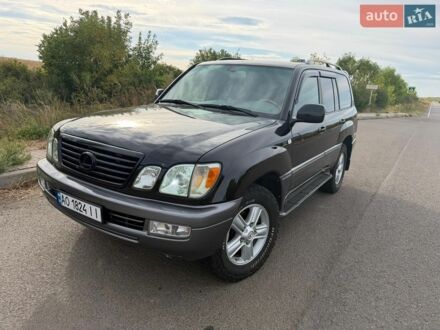 Черный Лексус ЛХ, объемом двигателя 4.7 л и пробегом 285 тыс. км за 15900 $, фото 1 на Automoto.ua