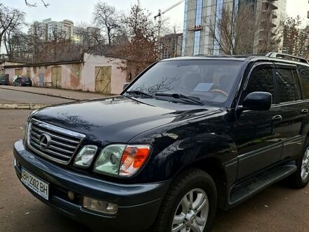 Черный Лексус ЛХ, объемом двигателя 4.7 л и пробегом 300 тыс. км за 12000 $, фото 1 на Automoto.ua