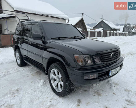 Черный Лексус ЛХ, объемом двигателя 4.67 л и пробегом 300 тыс. км за 15000 $, фото 1 на Automoto.ua