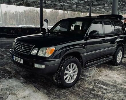 Черный Лексус ЛХ, объемом двигателя 4.66 л и пробегом 310 тыс. км за 12500 $, фото 1 на Automoto.ua