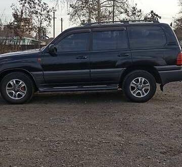 Чорний Лексус ЛХ, об'ємом двигуна 4.7 л та пробігом 330 тис. км за 16500 $, фото 1 на Automoto.ua