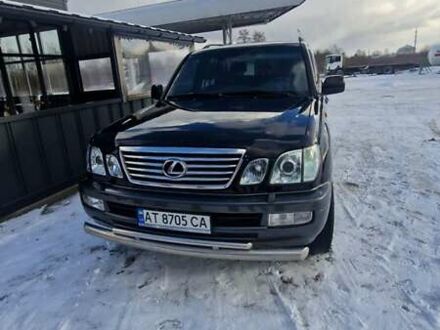 Черный Лексус ЛХ, объемом двигателя 4.7 л и пробегом 297 тыс. км за 14800 $, фото 1 на Automoto.ua