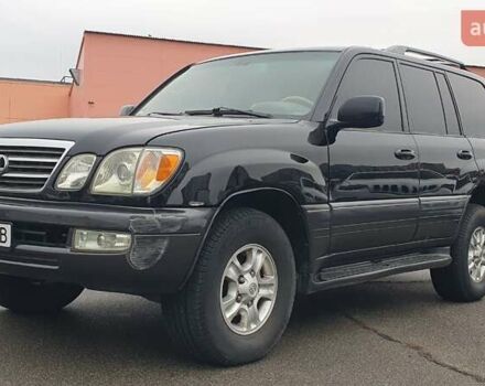 Черный Лексус ЛХ, объемом двигателя 4.66 л и пробегом 171 тыс. км за 12000 $, фото 1 на Automoto.ua