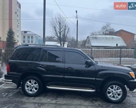 Чорний Лексус ЛХ, об'ємом двигуна 4.7 л та пробігом 230 тис. км за 14500 $, фото 1 на Automoto.ua