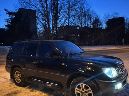 Черный Лексус ЛХ, объемом двигателя 4.7 л и пробегом 335 тыс. км за 17000 $, фото 1 на Automoto.ua