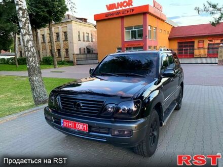 Черный Лексус ЛХ, объемом двигателя 4.7 л и пробегом 256 тыс. км за 14500 $, фото 1 на Automoto.ua
