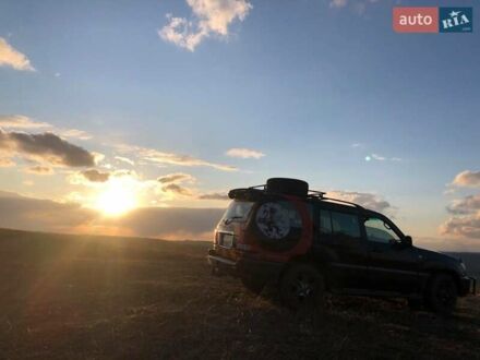 Чорний Лексус ЛХ, об'ємом двигуна 4.7 л та пробігом 290 тис. км за 17500 $, фото 1 на Automoto.ua