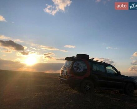 Черный Лексус ЛХ, объемом двигателя 4.7 л и пробегом 290 тыс. км за 17500 $, фото 1 на Automoto.ua