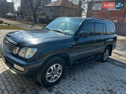 Чорний Лексус ЛХ, об'ємом двигуна 4.66 л та пробігом 422 тис. км за 12000 $, фото 1 на Automoto.ua