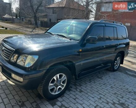 Черный Лексус ЛХ, объемом двигателя 4.66 л и пробегом 422 тыс. км за 12000 $, фото 1 на Automoto.ua