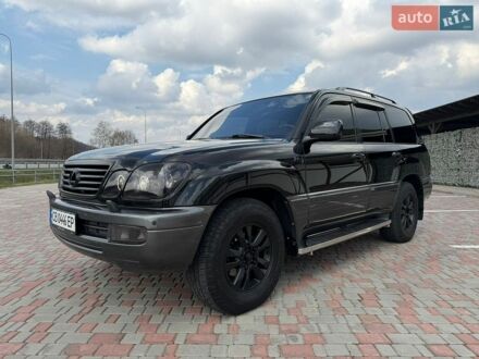 Черный Лексус ЛХ, объемом двигателя 4.7 л и пробегом 256 тыс. км за 14500 $, фото 1 на Automoto.ua