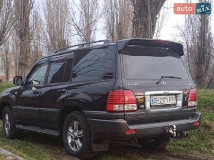 Черный Лексус ЛХ, объемом двигателя 4.7 л и пробегом 238 тыс. км за 18500 $, фото 1 на Automoto.ua