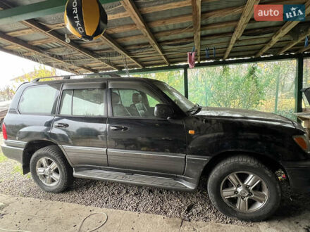 Черный Лексус ЛХ, объемом двигателя 4.7 л и пробегом 270 тыс. км за 14800 $, фото 1 на Automoto.ua