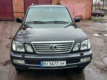 Черный Лексус ЛХ, объемом двигателя 4.7 л и пробегом 240 тыс. км за 14800 $, фото 1 на Automoto.ua