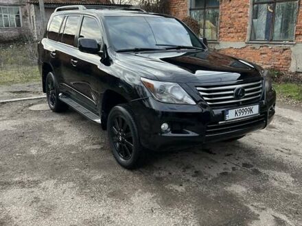 Черный Лексус ЛХ, объемом двигателя 5.66 л и пробегом 300 тыс. км за 24000 $, фото 1 на Automoto.ua