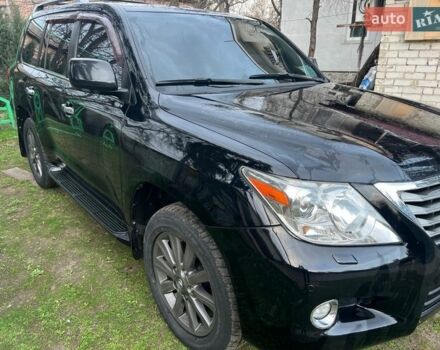 Черный Лексус ЛХ, объемом двигателя 5.7 л и пробегом 250 тыс. км за 22000 $, фото 1 на Automoto.ua