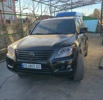 Черный Лексус ЛХ, объемом двигателя 5.66 л и пробегом 200 тыс. км за 21000 $, фото 1 на Automoto.ua