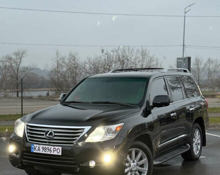 Черный Лексус ЛХ, объемом двигателя 5.66 л и пробегом 350 тыс. км за 23200 $, фото 1 на Automoto.ua