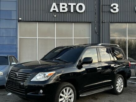 Черный Лексус ЛХ, объемом двигателя 5.7 л и пробегом 306 тыс. км за 21500 $, фото 1 на Automoto.ua