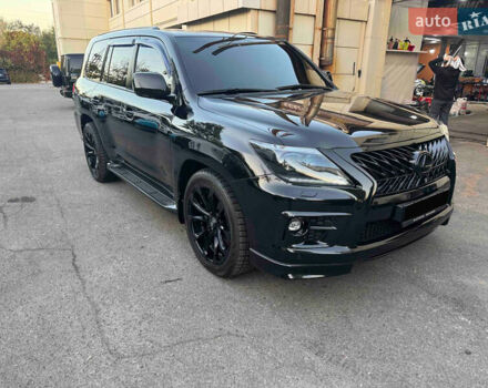 Черный Лексус ЛХ, объемом двигателя 5.7 л и пробегом 297 тыс. км за 35000 $, фото 1 на Automoto.ua