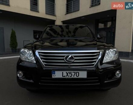 Черный Лексус ЛХ, объемом двигателя 5.66 л и пробегом 300 тыс. км за 20900 $, фото 1 на Automoto.ua