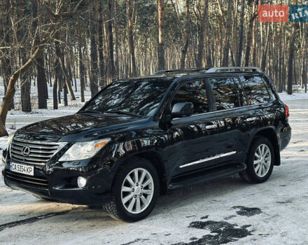 Черный Лексус ЛХ, объемом двигателя 5.66 л и пробегом 350 тыс. км за 24500 $, фото 1 на Automoto.ua