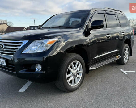 Черный Лексус ЛХ, объемом двигателя 5.66 л и пробегом 276 тыс. км за 20900 $, фото 1 на Automoto.ua