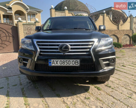 Чорний Лексус ЛХ, об'ємом двигуна 5.66 л та пробігом 242 тис. км за 21500 $, фото 1 на Automoto.ua