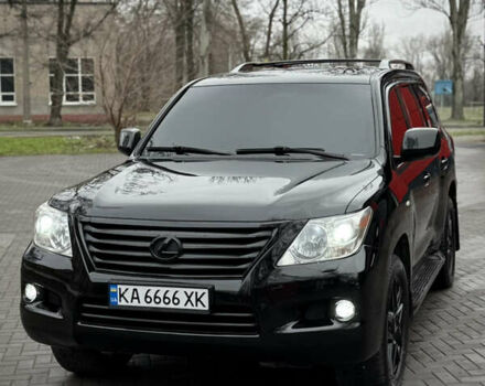 Черный Лексус ЛХ, объемом двигателя 5.7 л и пробегом 220 тыс. км за 28500 $, фото 1 на Automoto.ua