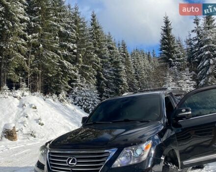 Черный Лексус ЛХ, объемом двигателя 5.66 л и пробегом 189 тыс. км за 19000 $, фото 1 на Automoto.ua