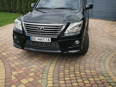 Черный Лексус ЛХ, объемом двигателя 5.66 л и пробегом 258 тыс. км за 27800 $, фото 1 на Automoto.ua