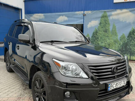 Черный Лексус ЛХ, объемом двигателя 5.66 л и пробегом 240 тыс. км за 25000 $, фото 1 на Automoto.ua