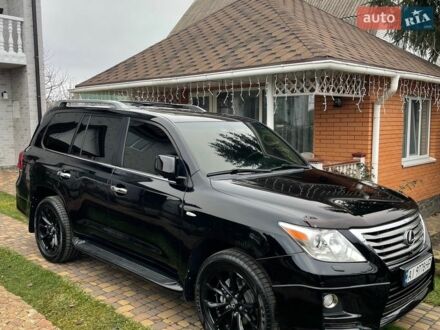 Черный Лексус ЛХ, объемом двигателя 5.66 л и пробегом 234 тыс. км за 27200 $, фото 1 на Automoto.ua