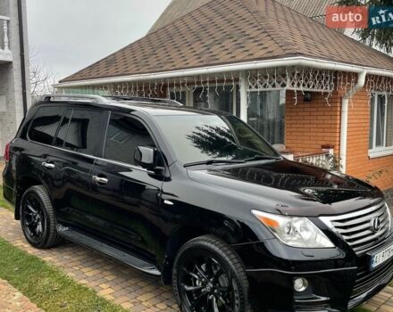 Черный Лексус ЛХ, объемом двигателя 5.66 л и пробегом 234 тыс. км за 27200 $, фото 1 на Automoto.ua