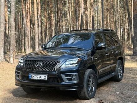Черный Лексус ЛХ, объемом двигателя 5.66 л и пробегом 247 тыс. км за 31000 $, фото 1 на Automoto.ua