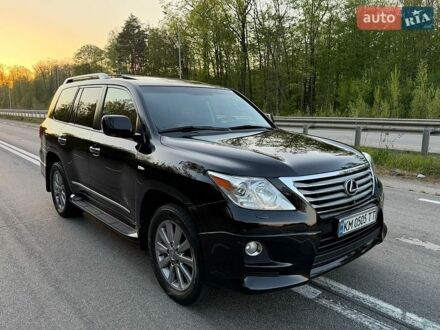 Черный Лексус ЛХ, объемом двигателя 5.66 л и пробегом 242 тыс. км за 28800 $, фото 1 на Automoto.ua