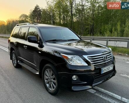 Черный Лексус ЛХ, объемом двигателя 5.66 л и пробегом 242 тыс. км за 28800 $, фото 1 на Automoto.ua