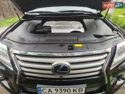 Черный Лексус ЛХ, объемом двигателя 5.66 л и пробегом 167 тыс. км за 32000 $, фото 1 на Automoto.ua