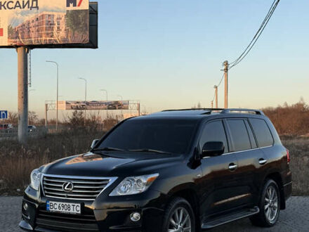 Черный Лексус ЛХ, объемом двигателя 5.66 л и пробегом 180 тыс. км за 27500 $, фото 1 на Automoto.ua