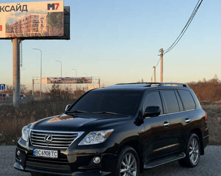 Черный Лексус ЛХ, объемом двигателя 5.66 л и пробегом 180 тыс. км за 27500 $, фото 1 на Automoto.ua