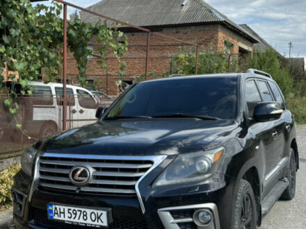 Черный Лексус ЛХ, объемом двигателя 5.66 л и пробегом 320 тыс. км за 33000 $, фото 1 на Automoto.ua