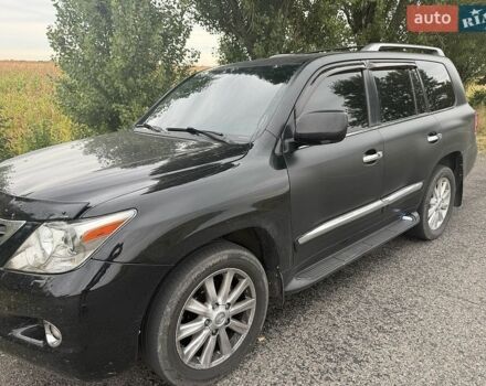 Черный Лексус ЛХ, объемом двигателя 5.7 л и пробегом 350 тыс. км за 23000 $, фото 1 на Automoto.ua