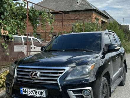 Черный Лексус ЛХ, объемом двигателя 5.66 л и пробегом 320 тыс. км за 33000 $, фото 1 на Automoto.ua