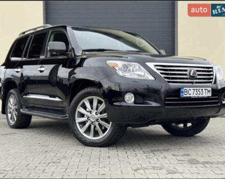 Черный Лексус ЛХ, объемом двигателя 5.66 л и пробегом 142 тыс. км за 36000 $, фото 1 на Automoto.ua